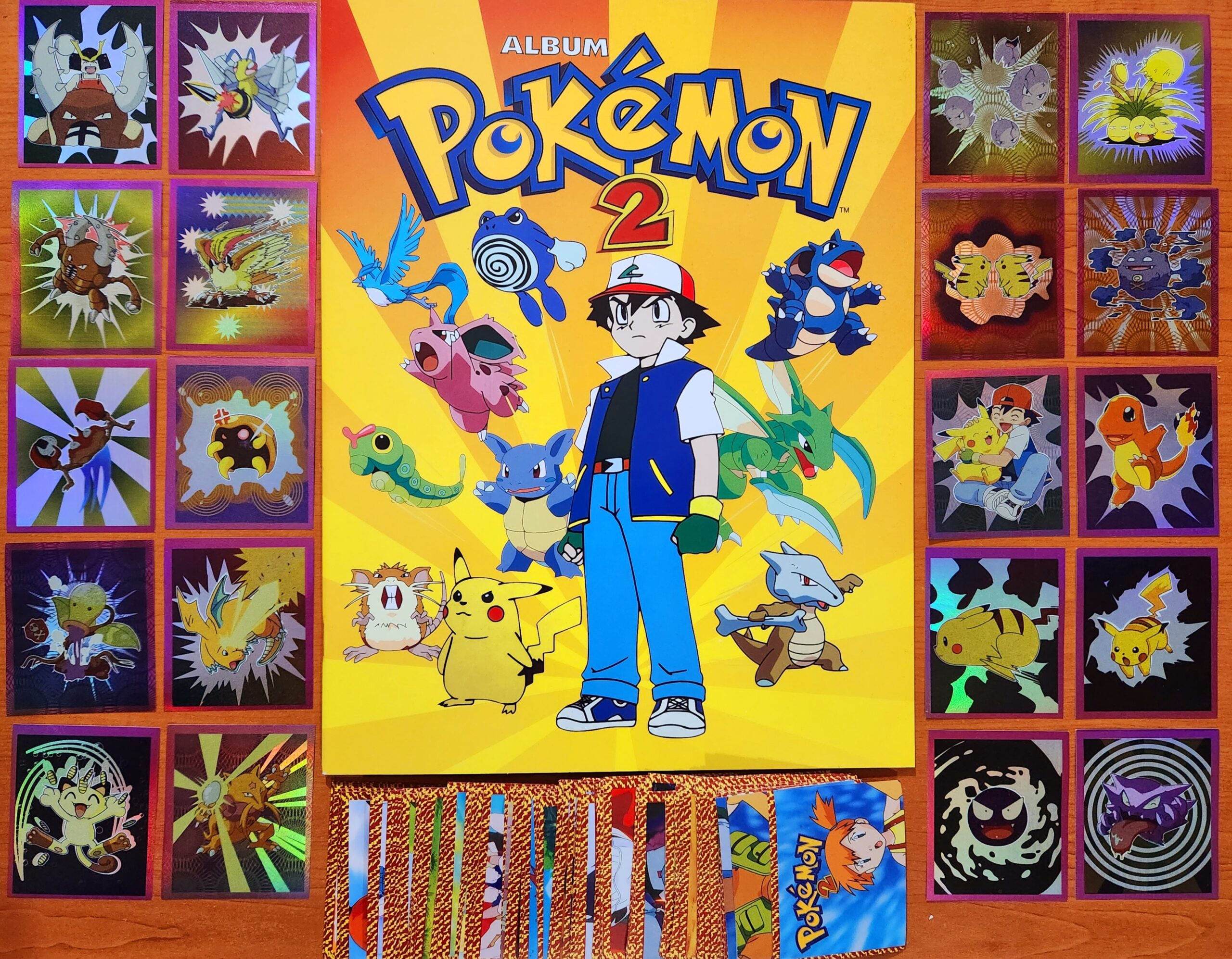 Pokémon 2: Álbum con todas sus láminas a pegar foto 1 Pokémon 2: Álbum con todas sus láminas a pegar foto 1